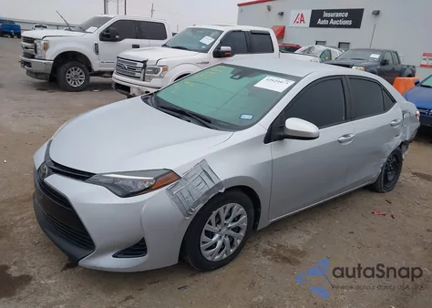 2017 Toyota Corolla Le z USA, uszkodzony, nr VIN 2T1BURHEXHC835817